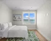 Bedroom featuring wood-type flooring