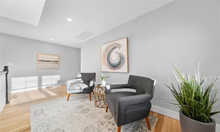 Living area featuring light hardwood / wood-style flooring