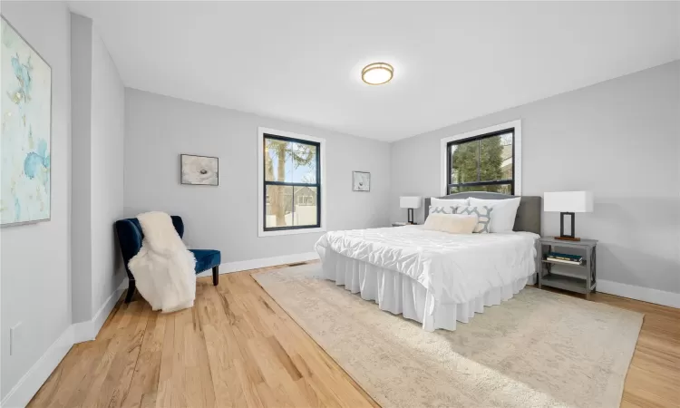 Bedroom featuring hardwood / wood-style flooring