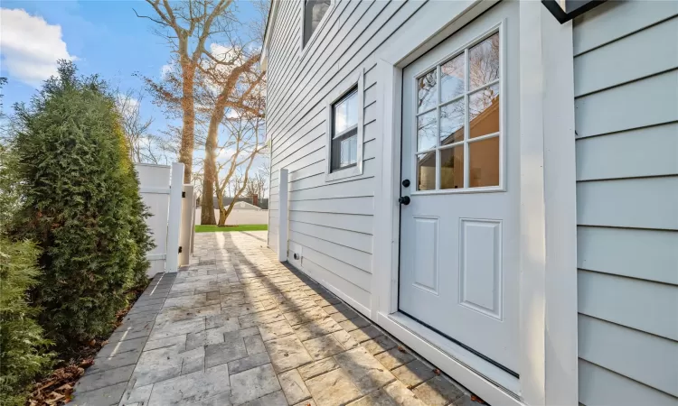 Property entrance featuring a patio