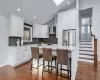 Newly renovate kitchen featuring new cabinets, quartz countertops & GE Cafe stainless steel appliances