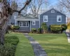 View of front of property with a front lawn