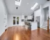 Open layout floor plan featuring dining area adjacent to breakfast bar/island