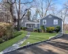 View of front of home featuring a front lawn