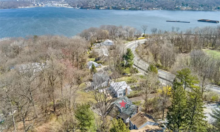 Aerial view featuring a water view