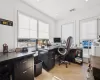 Office area with light parquet flooring