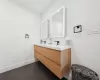 Bathroom featuring tile patterned floors and vanity