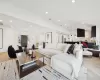 Living room featuring light parquet flooring