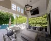 View of patio / terrace with grilling area, exterior kitchen, and an outdoor living space