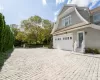 View of property exterior featuring a garage