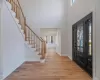 Entrance foyer featuring light hardwood / wood-style flooring