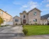 Front of property with a front lawn