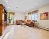 Living room featuring light tile patterned floors