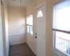 Foyer with dark hardwood / wood-style floors