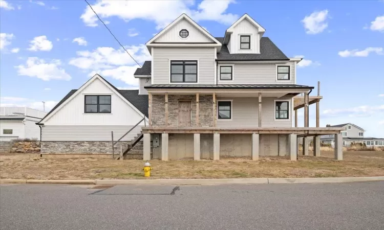 View of front of home featuring a porch