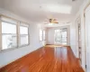 Empty room featuring ceiling fan and light hardwood / wood-style flooring