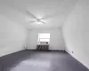 Empty room with ceiling fan and radiator heating unit