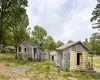 View of front of property featuring an outbuilding