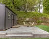 View of patio with a fire pit