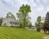 View of yard featuring covered porch