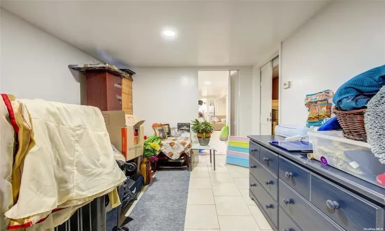 Miscellaneous room with light tile patterned floors