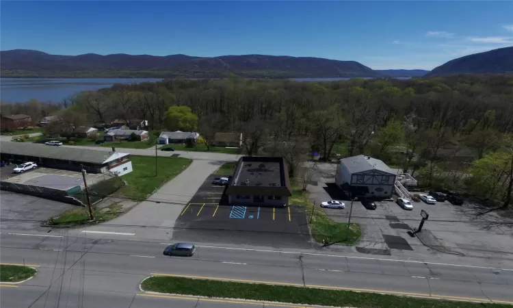 Bird's eye view featuring a water and mountain view