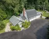 Four plus car garage with attached Lord and Burnham Greenhouse