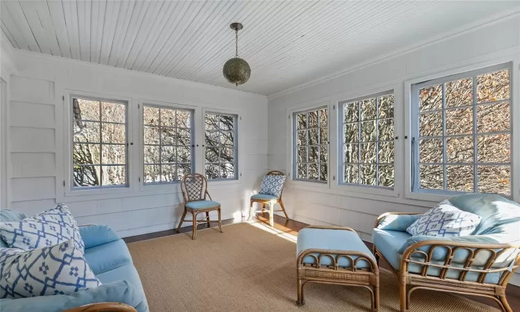 elegant ensuite sunroom off of bedroom on the second floor