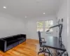 Home office with crown molding and light hardwood / wood-style flooring