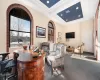 Carpeted home office with coffered ceiling