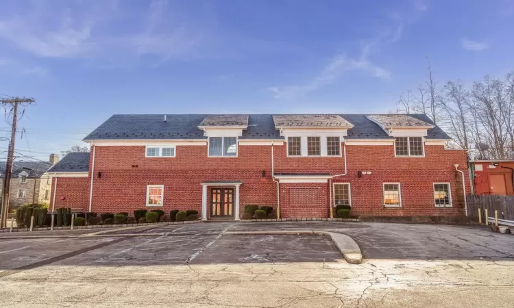 View of front of property featuring a garage