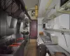 Kitchen with dark tile patterned flooring