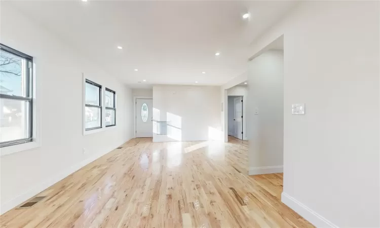 Unfurnished room with light hardwood / wood-style floors