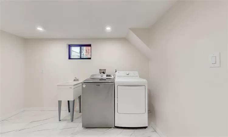 Laundry area with separate washer and dryer