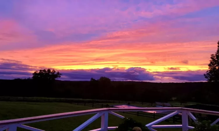 Property view of mountains at sunset