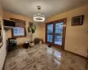 Dining area with an inviting chandelier