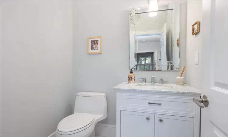 Bathroom with vanity and toilet