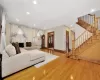 Living room with hardwood / wood-style floors