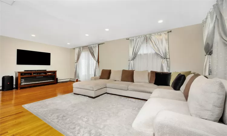 Living room featuring wood-type flooring