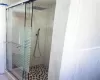 Bathroom featuring an enclosed shower