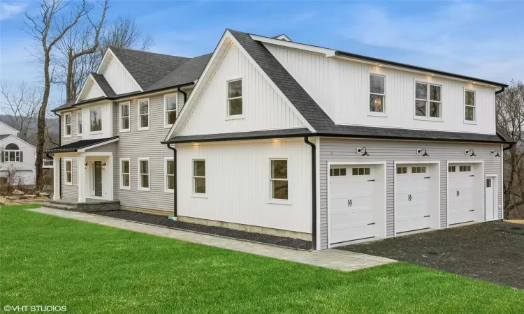 View of front of property with 3 car garage