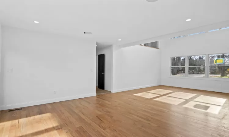 Unfurnished living room featuring light hardwood / wood-style flooring