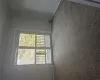 Unfurnished room with carpet and crown molding