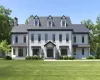 View of front facade featuring a front yard