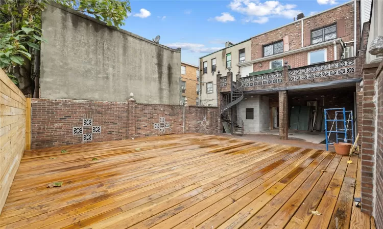 Wooden deck with a patio