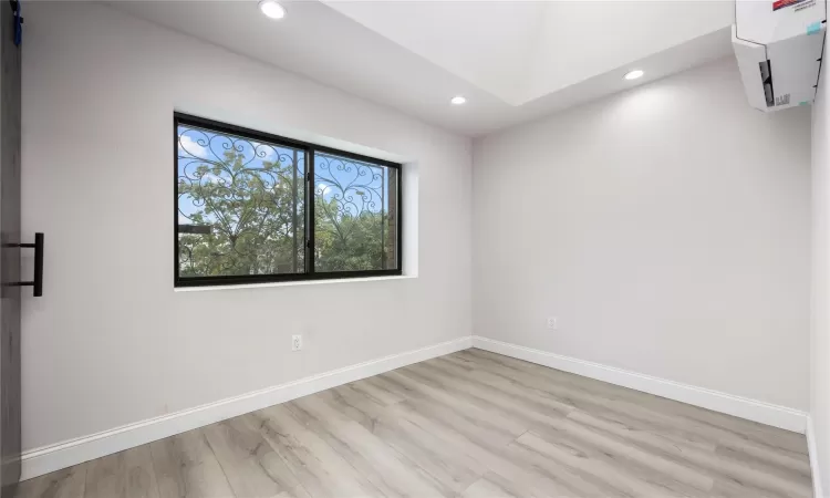 Unfurnished room featuring light wood-type flooring