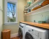 Clothes washing area with separate washer and dryer