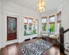 Sunroom with a chandelier