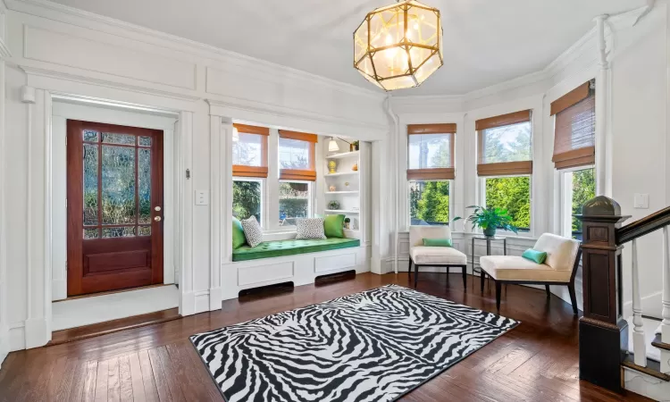 Sunroom with a chandelier