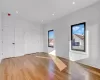 Unfurnished room with light wood-type flooring